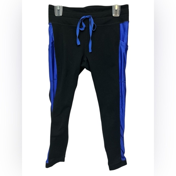 Fabletics Women Mid-Rise Powerhold Tie Waist 7/8 Legging Black/Lapis Shine - Picture 1 of 6